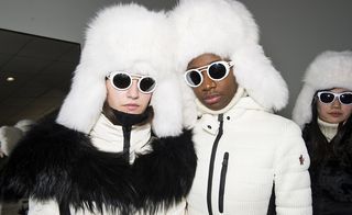 An image of models with fluffy white hats and Willy Wonka-style goggles stole the show at Moncler Grenoble.