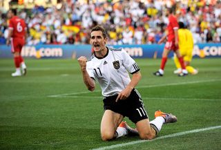 The best German players ever Miroslav Klose of Germany celebrates scoring the opening goal during the 2010 FIFA World Cup South Africa Round of Sixteen match between Germany and England at Free State Stadium on June 27, 2010 in Bloemfontein, South Africa. (Photo by Michael Regan/Getty Images)