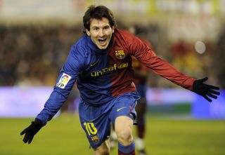 Lionel Messi celebrates a goal for Barcelona against Racing Santander in February 2009.