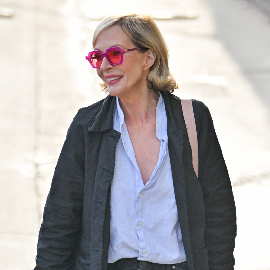 allison janney wearing a flipped bob and pink sunglasses