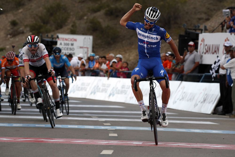 Julian Alaphilippe (Deceuninck-QuickStep) hits the line first