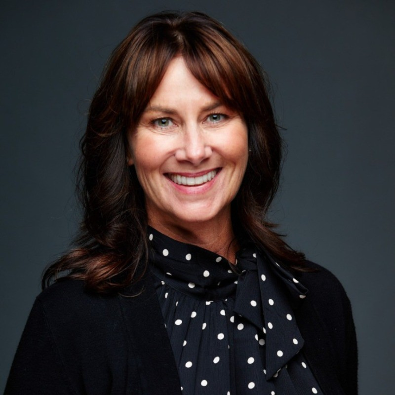 Head and shoulders of smiling woman