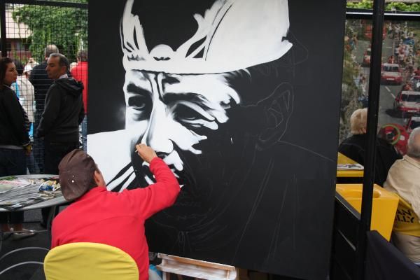 Stephen Roche is given the icon treatment in the start village at Limoux.