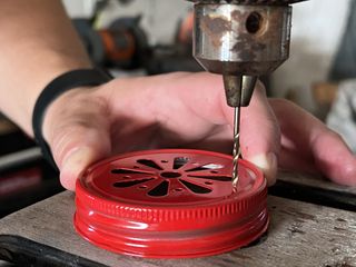 drilling holes in lid
