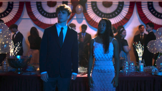 Walker Scobell and Leah Jeffries as Percy and Annabeth standing next to each other at a dance in Season 3 teaser