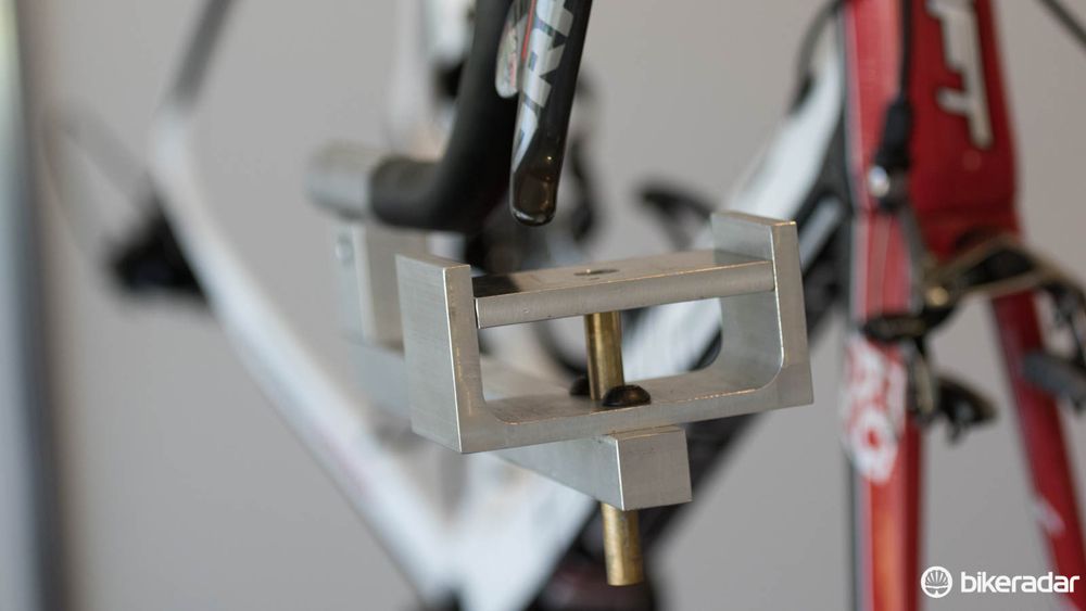 Jesse from Drapac has made this very early prototype (ie, it's the only one) used specially for adjusting brake levers to exact positions