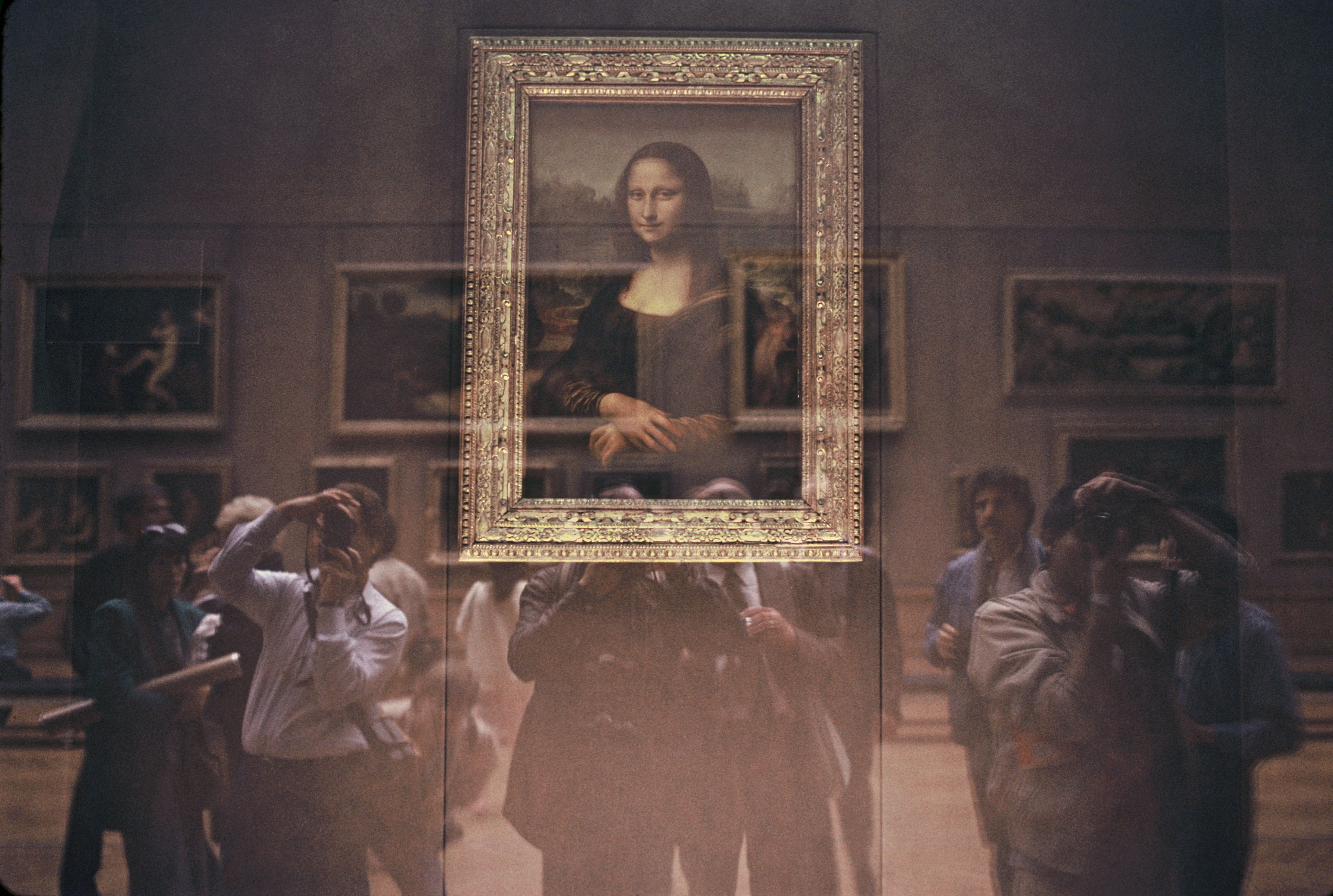 People photographing the Mona Lisa