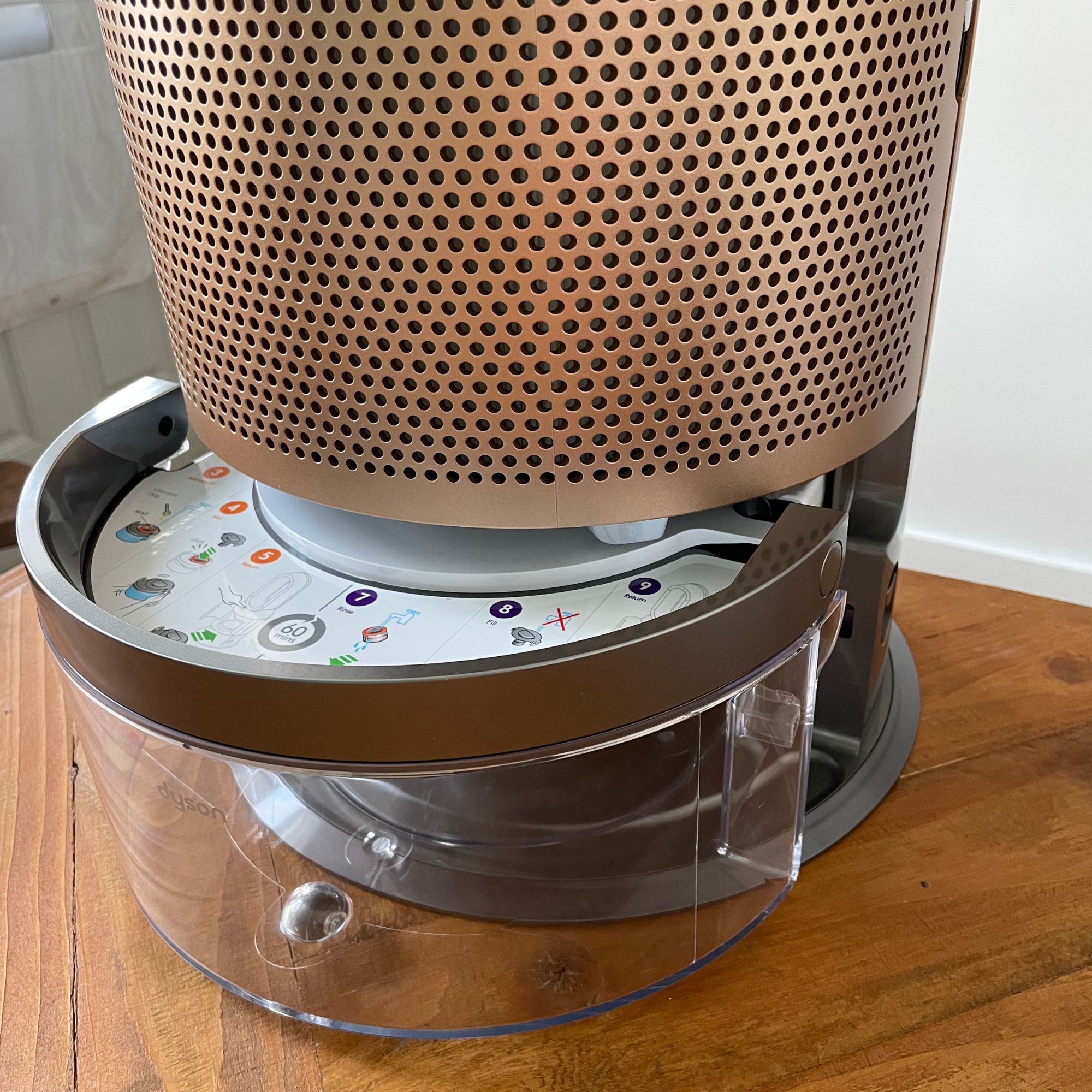 Dyson Purifier Humidify+Cool PH2 De-Nox water reservoir sitting on wooden table