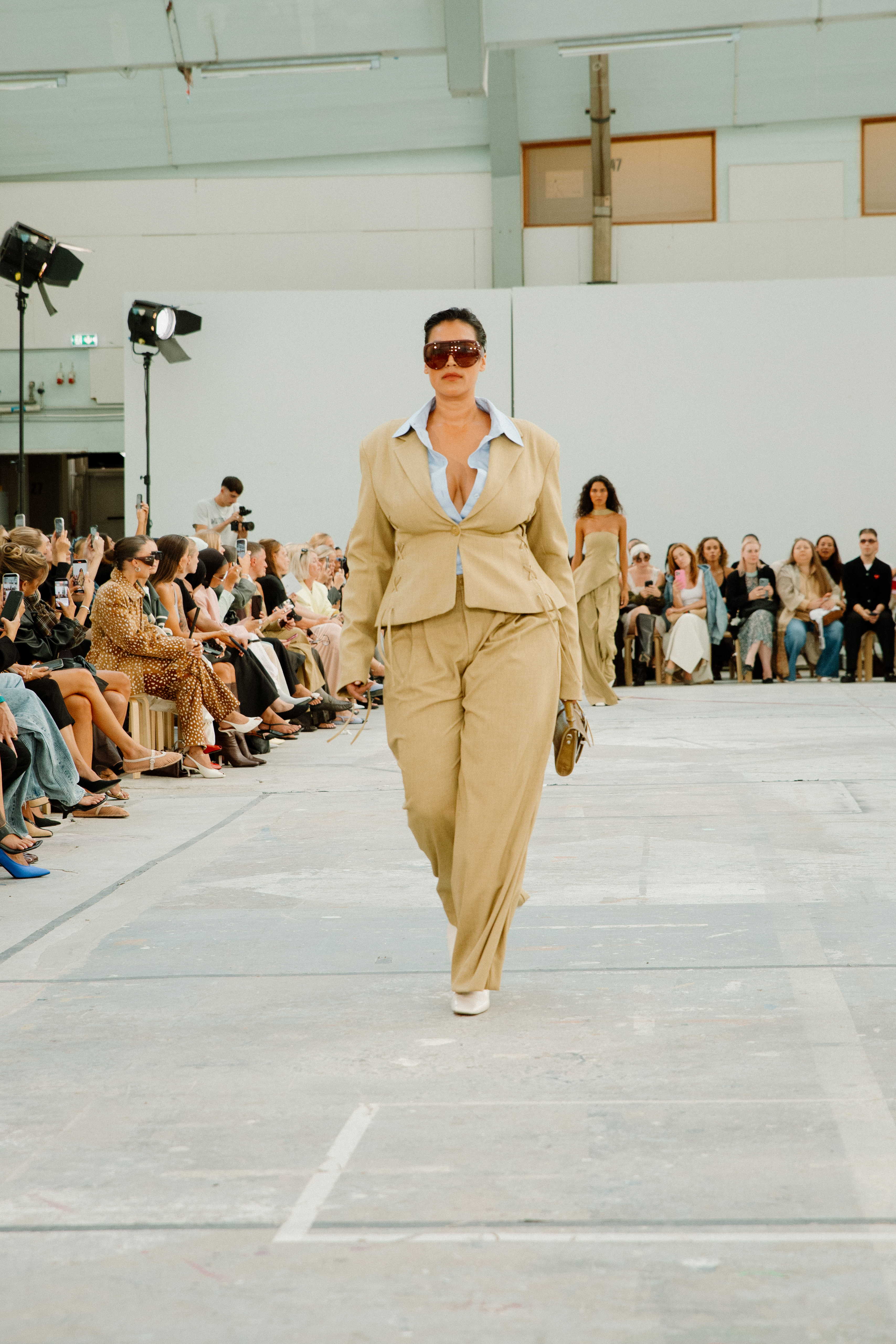Jennifer Atilemile walking in a show during Copenhagen Fashion Week.