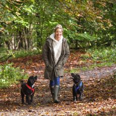 Gemma Atkinson walks her dogs Sproodle Norman (left) and Cocker Spaniel Ollie in Old Kay's Park, Bury