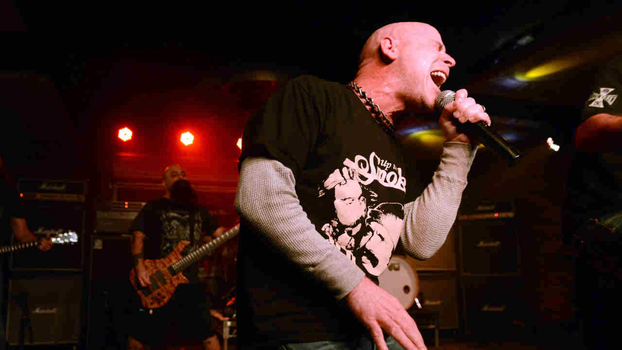 Armored Saint&amp;rsquo;s John Bush performing onstage in 2016