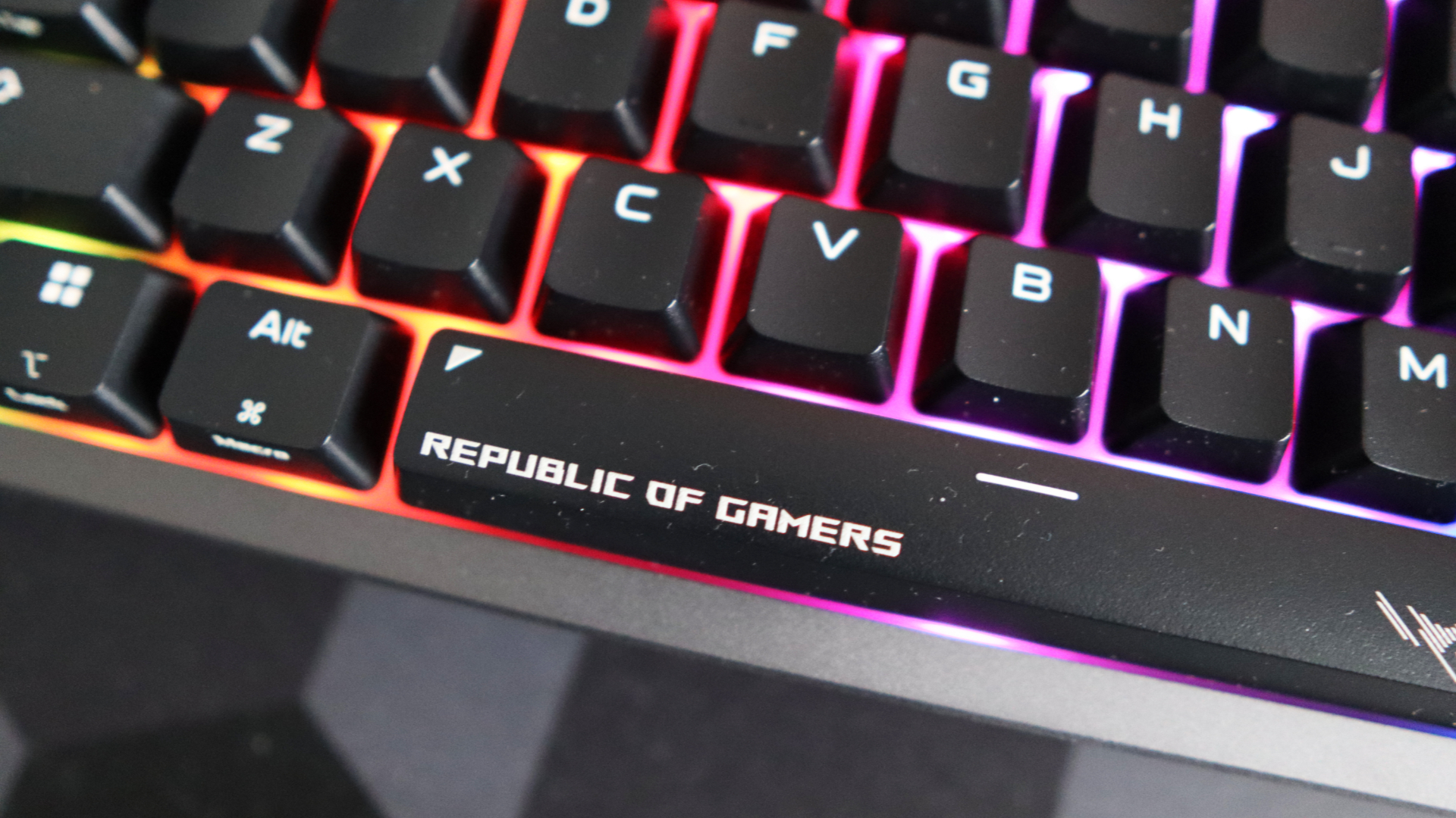 Asus ROG Strix Morph 96 Wireless on a desk mat.