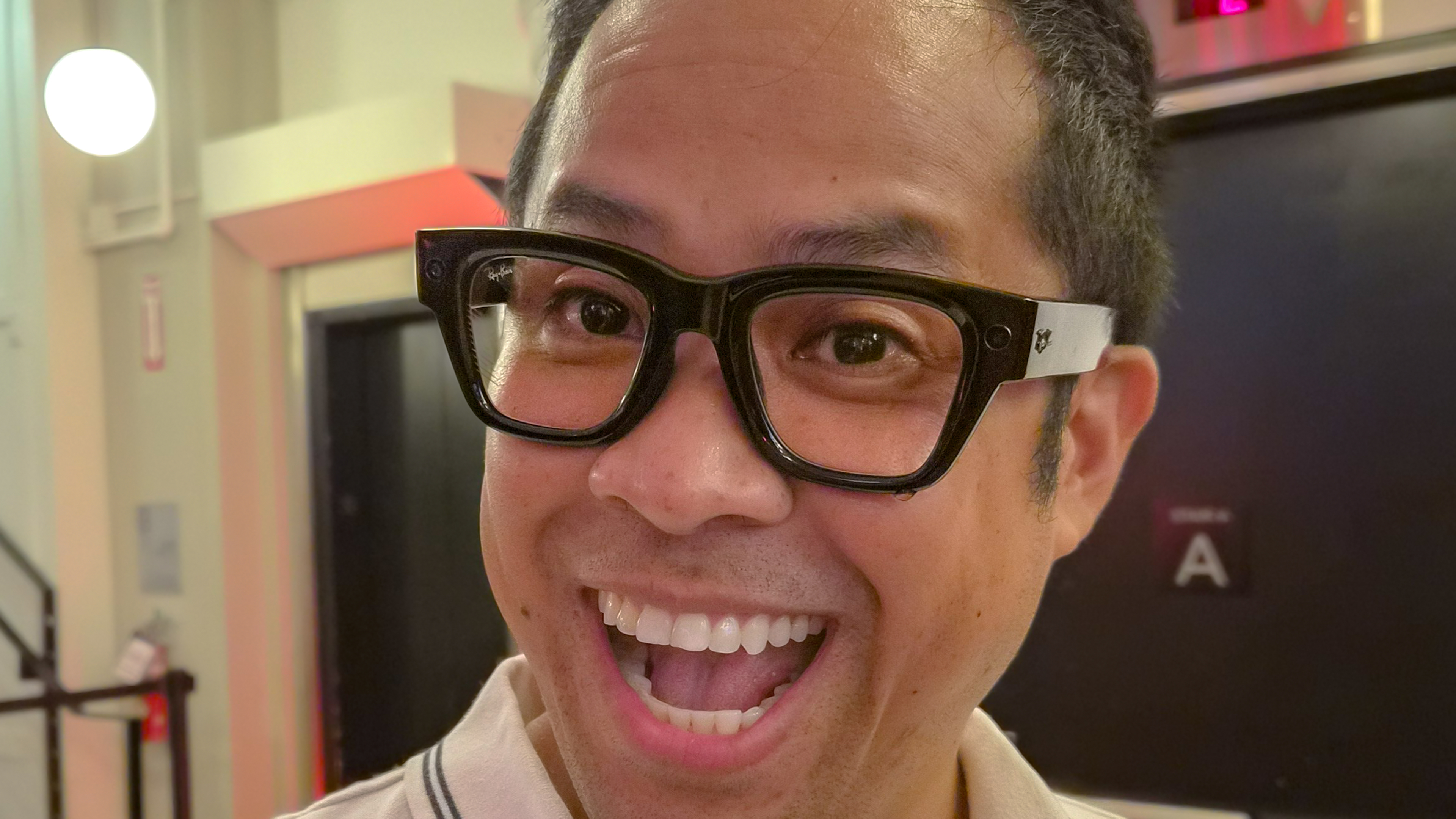 Meta Ray-Ban Display smart glasses worn on face.