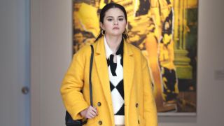 Selena Gomez in a yellow long-line jacket in Season 2 of Only Murders in the Building.