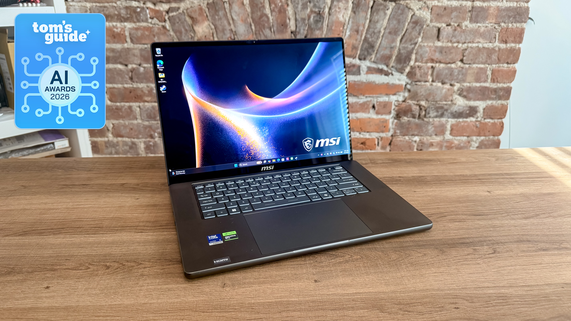 The MSI Stealth 16 AI+ (2026) on a table with a Tom's Guide AI Awards 2026 badge