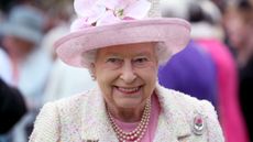 Queen Elizabeth II attends the annual garden party at the Palace of Holyroodhouse on July 4, 2017