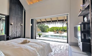 The bedroom in one of the villas at JOALI