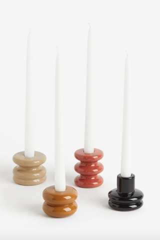 4 glazed stoneware candlesticks in neutral shades