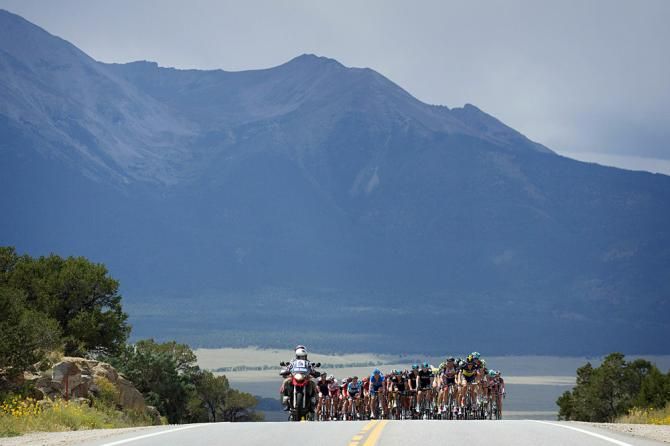 The Rocky Mountains tower over the peloton