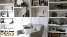 BILLY bookcase hack in a living room with white paint and stylish accessories
