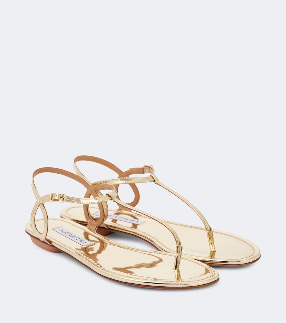 Almost Bare Metallic Leather Thong Sandals in Gold - Aquazzura