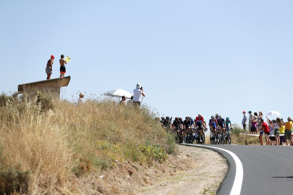 BURGOS SPAIN AUGUST 15 A general view of the peloton during the 76th Tour of Spain 2021 Stage 2 a 1667km stage from Caleruega Monasterio de Santo Domingo de Guzmn to Burgos Gamonal lavuelta LaVuelta21 CapitalMundialdelCiclismo on August 15 2021 in Burgos Spain Photo by Gonzalo Arroyo MorenoGetty Images