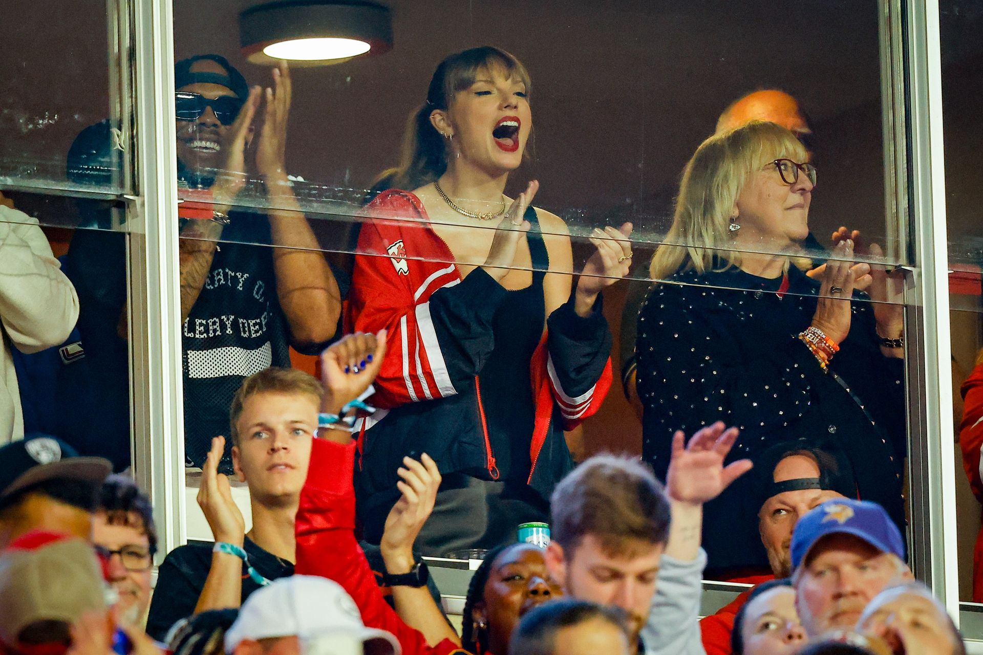 Taylor Swift styled a WEAR by Erin Andrews windbreaker at a Chiefs game in 2023