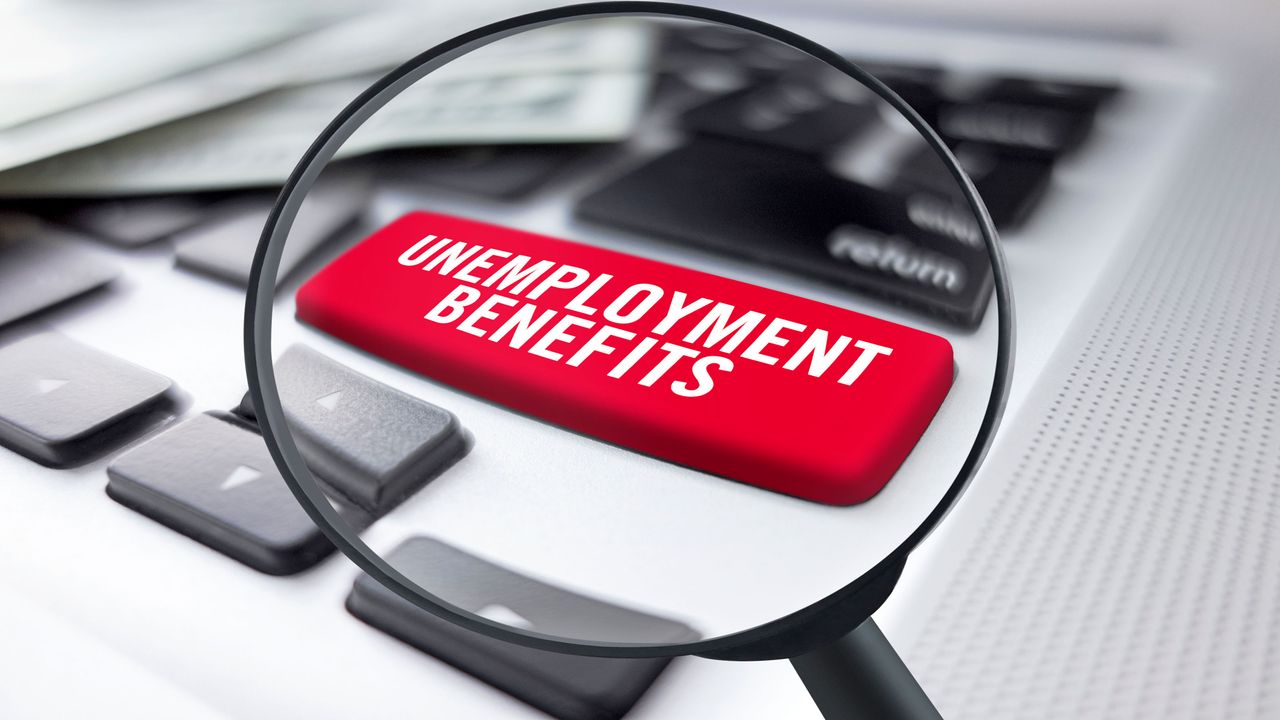 picture of magnified computer keyboard button that says &amp;quot;unemployment benefits&amp;quot;