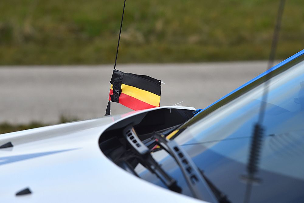 Belgium flag with black ribbon pinned to it to mourn the terrorist attacks in Brussels on Tuesday