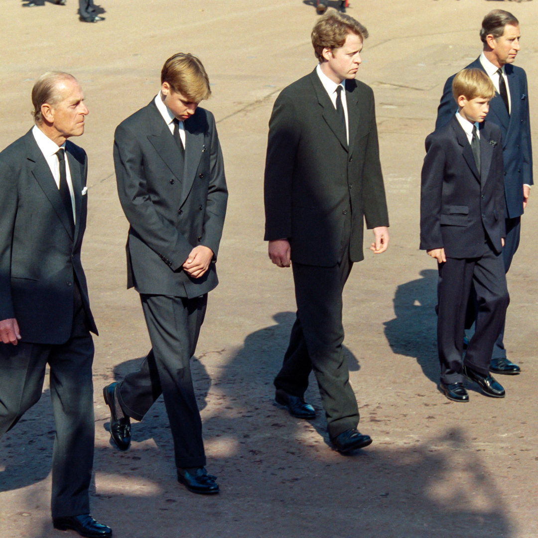 Prince Philip, Prince William, Earl Charles Spencer, Prince Harry, and King Charles walk together behind the carriage carrying the casket of Princess Diana on its way to the funeral