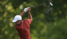 Scottie Scheffler at the top of his backswing