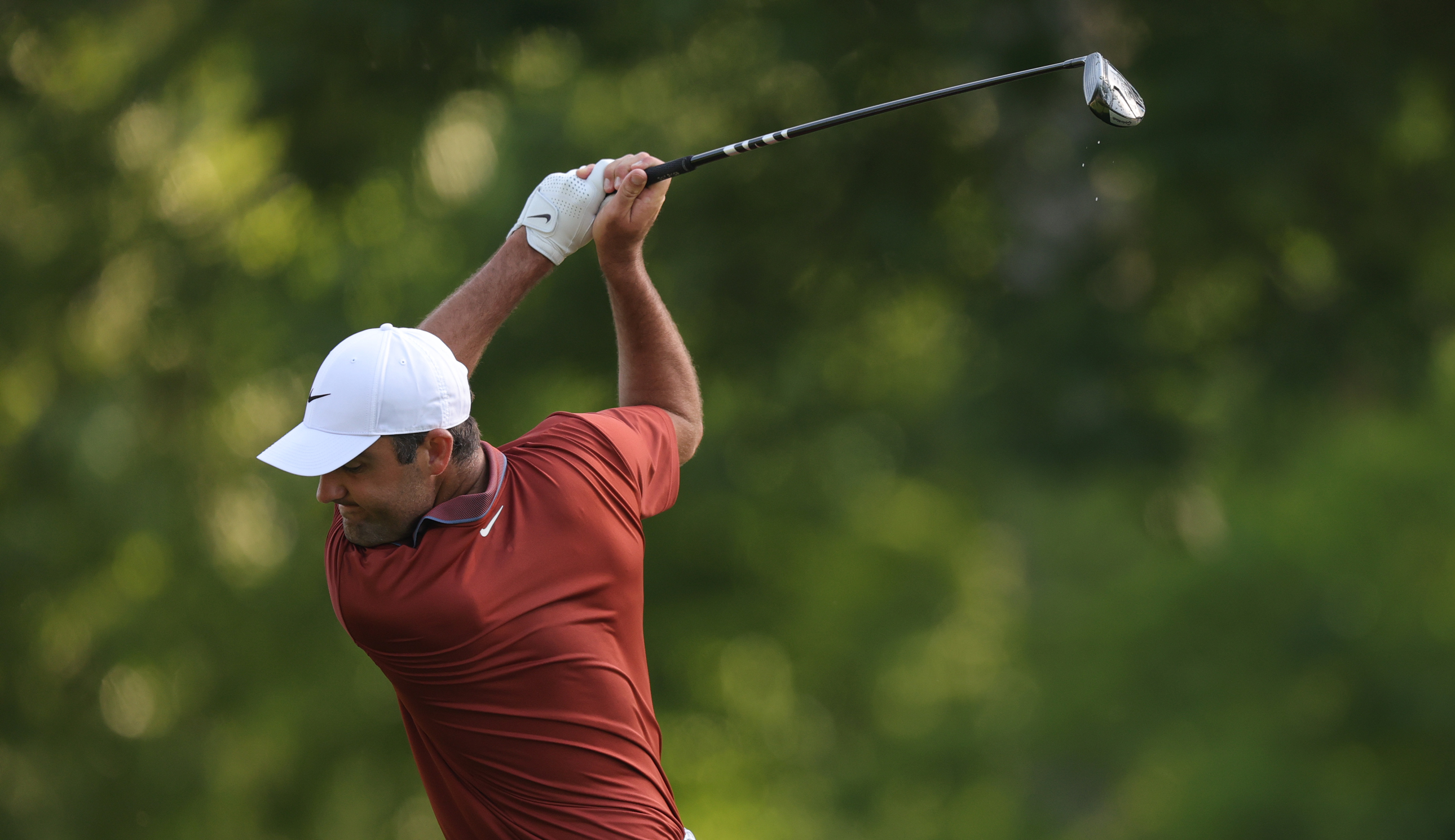 Scottie Scheffler at the top of his backswing