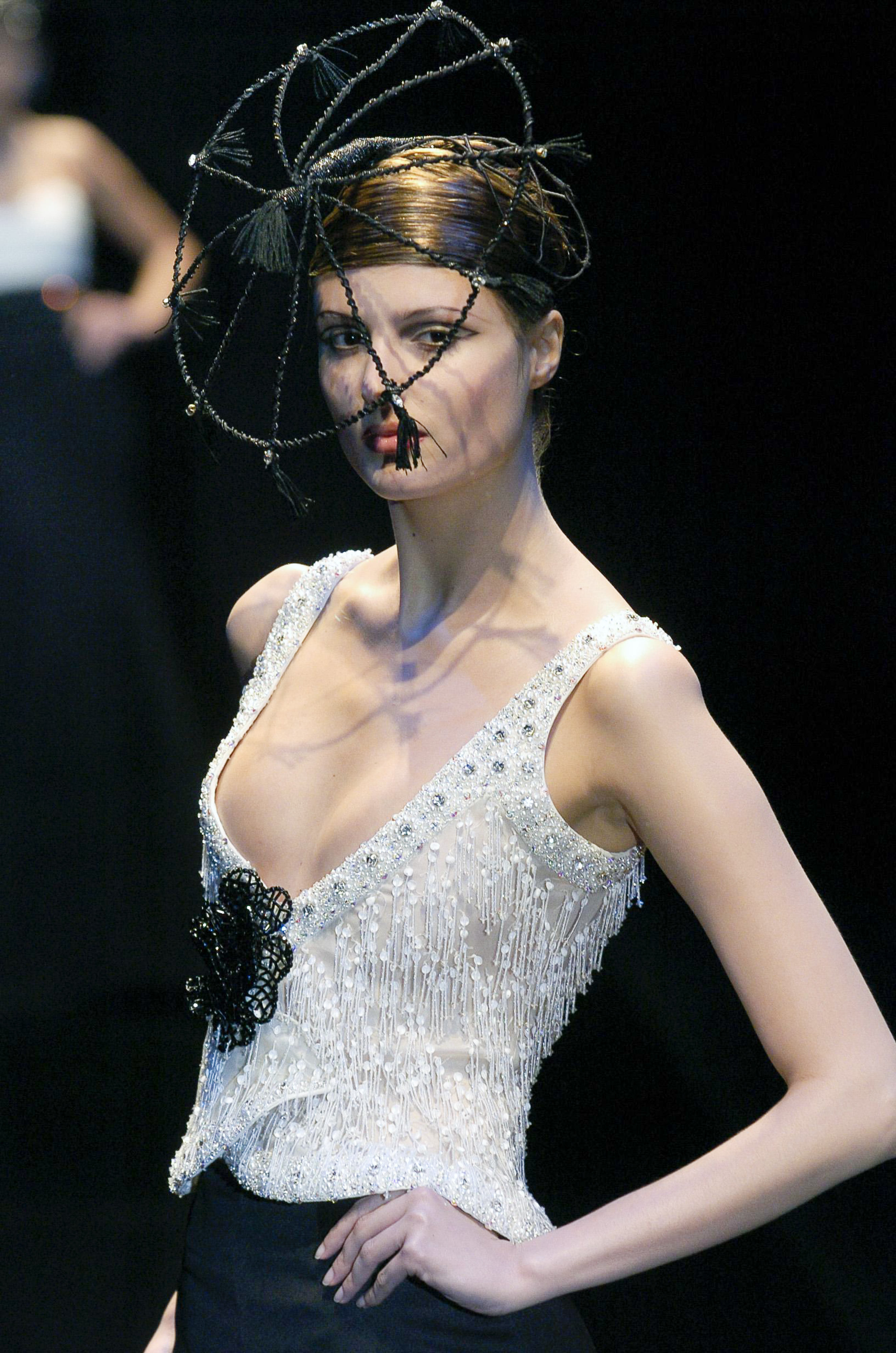 A model walks the runway during the Armani Priv&amp;eacute; Haute Couture Spring/Summer 2005 fashion show as part of the Paris Haute Couture Fashion Week on January 23, 2005