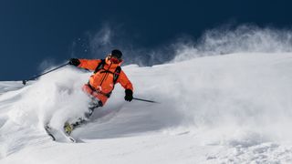 Person powder skiing in Verbier