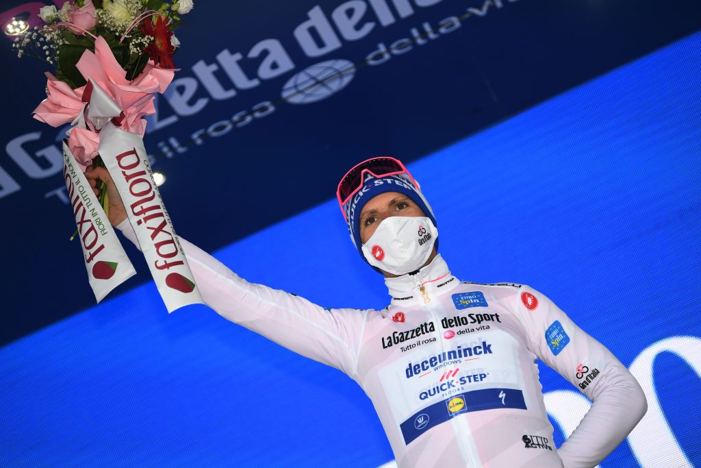 TORTORETO ITALY OCTOBER 13 Podium Joao Almeida of Portugal and Team Deceuninck QuickStep White Best Young Rider Jersey Celebration Flowers during the 103rd Giro dItalia 2020 Stage 10 a 177km stage from Lanciano to Tortoreto girodiitalia Giro on October 13 2020 in Tortoreto Italy Photo by Tim de WaeleGetty Images