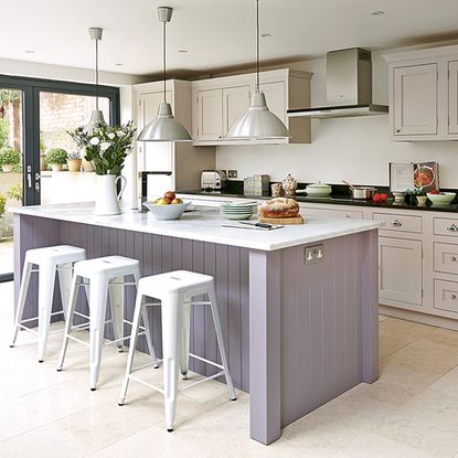 kitchen room with white walls and kitchen cabinets