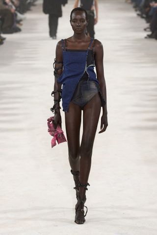 Woman in denim Y/Project outfit on runway