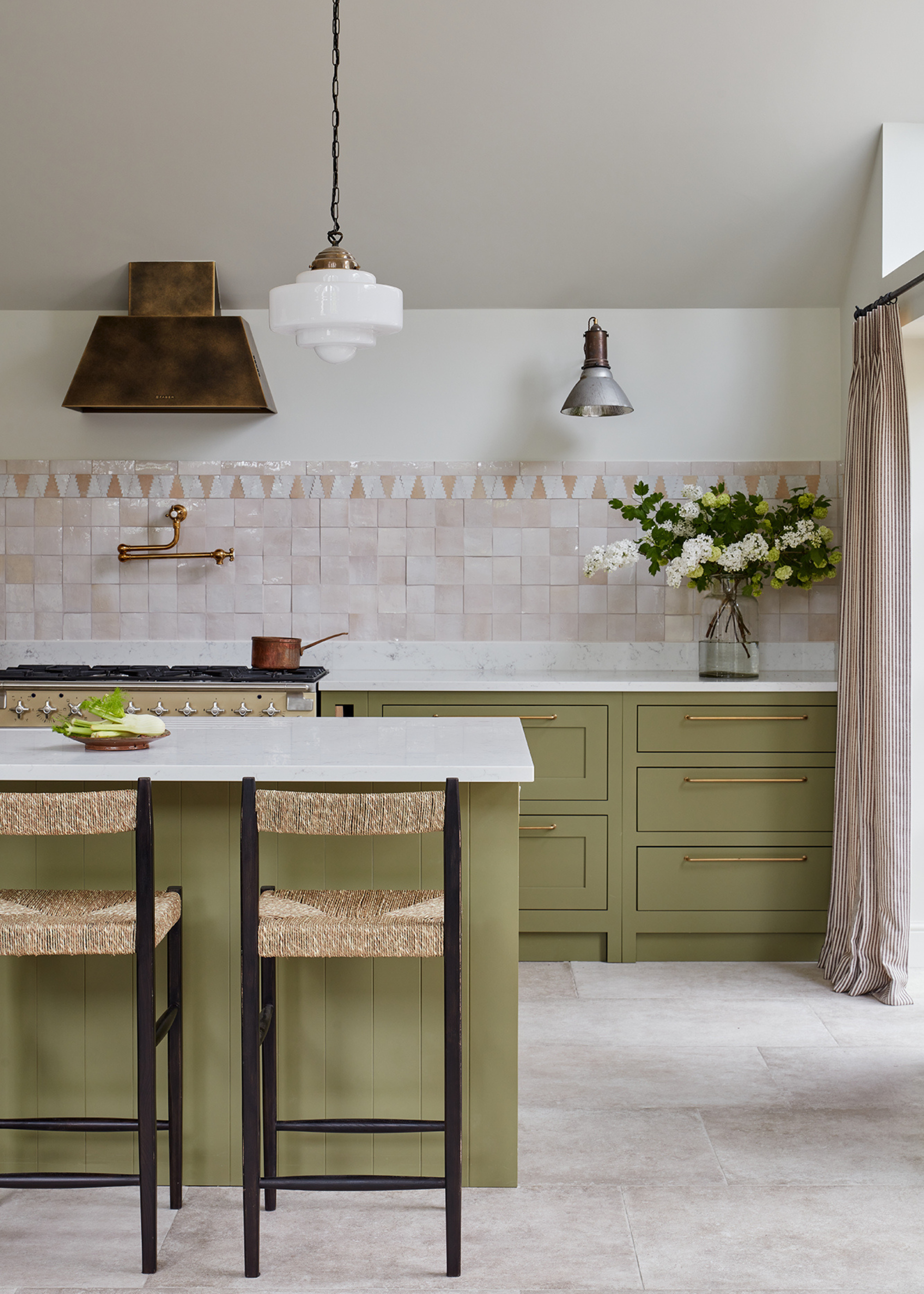 sage green ktichen with light zellige tile backsplash
