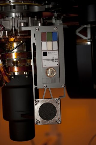 Calibration targets for Mars rover Curiosity including a 1909 Lincoln penny seen in this photo.