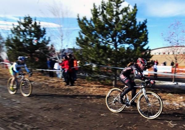 Katie Compton (Planet Bike) leading Mo Bruno-Roy after the start.