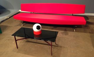 red sofa from 1958 and the eyeball statue