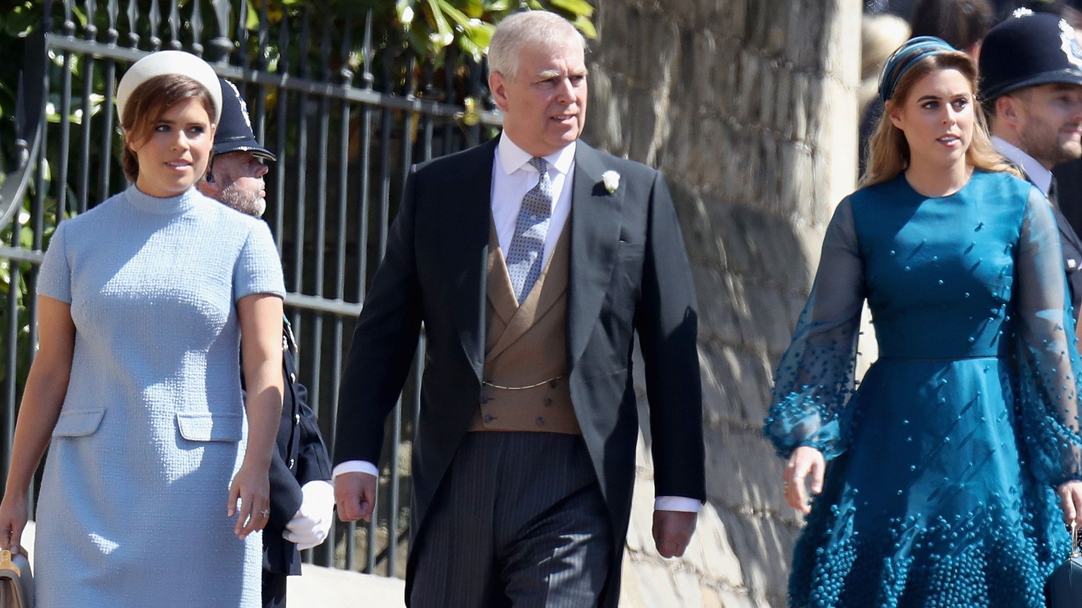 Andrew, Princess Eugenie and Princess Beatrice arrive for the wedding of Harry and Meghan in 2018