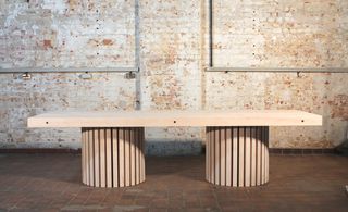 Wooden bench with thick columns