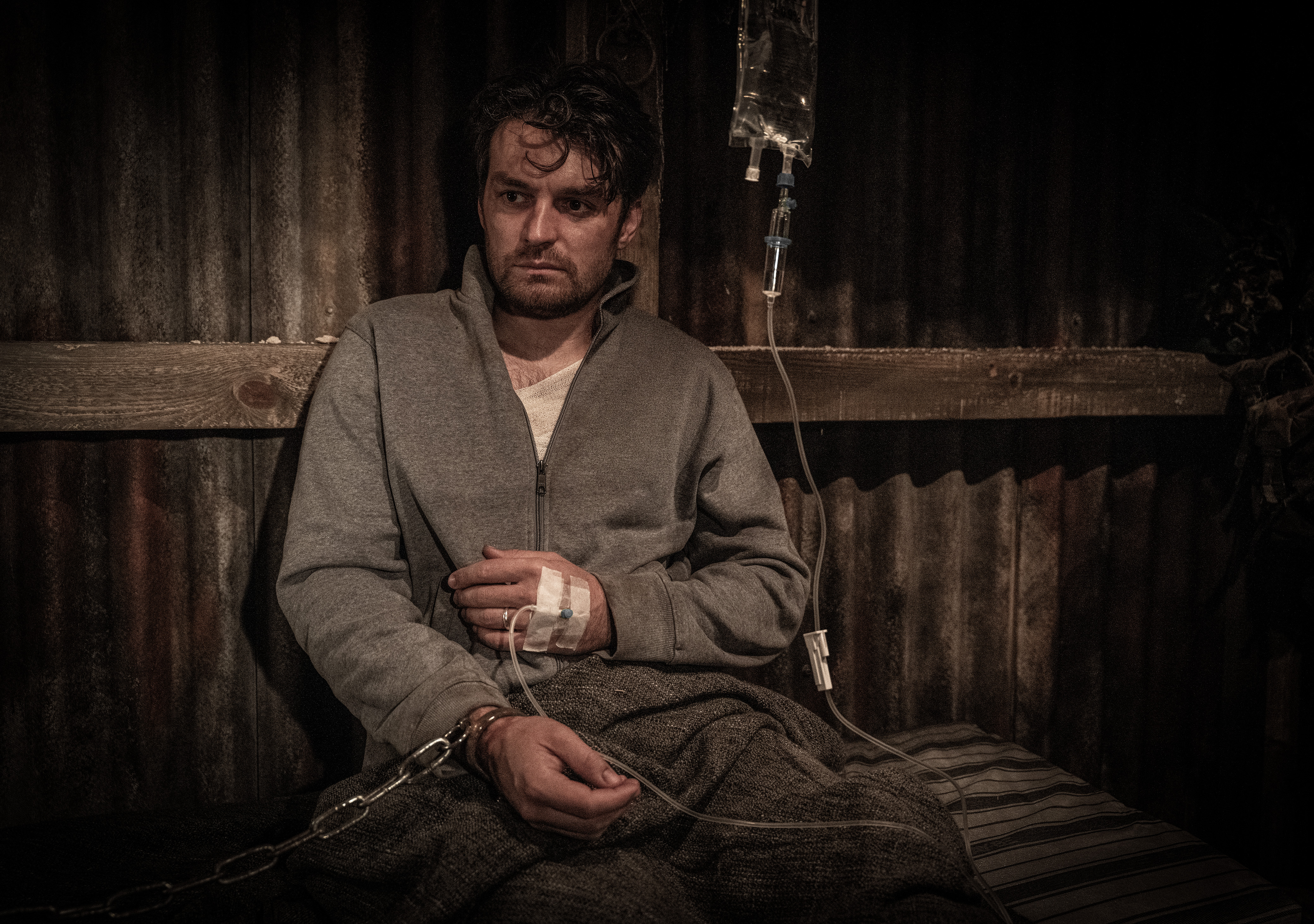 &amp;hellip; and is being held prisoner by psycho John Sugden in an underground bunker
