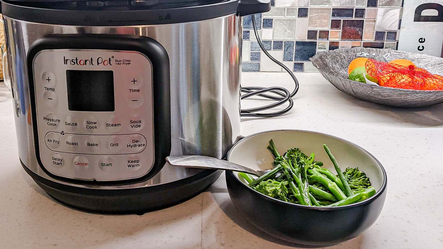 Instant Pot Duo Crisp and Air Fryer with cooked vegetables