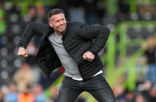 Forest Green manager Rob Edwards celebrates victory over Oldham