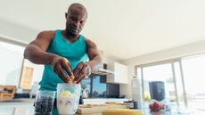 man cooking with protein
