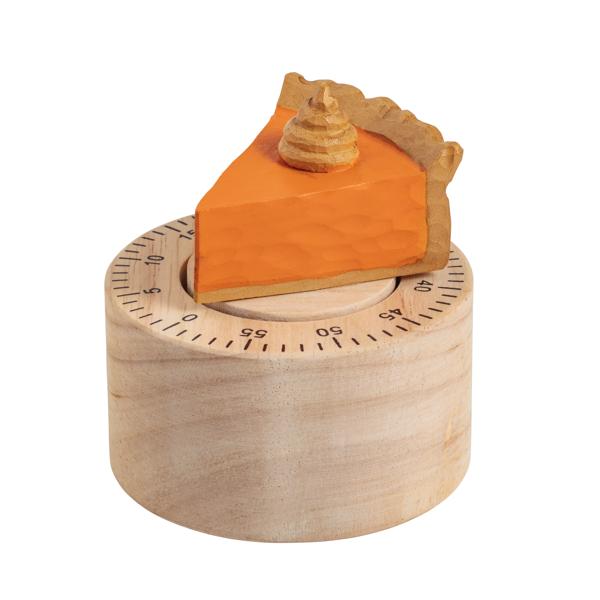 A kitchen timer with a piece of pumpkin pie on top