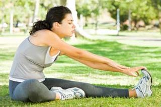 Woman stretching before running