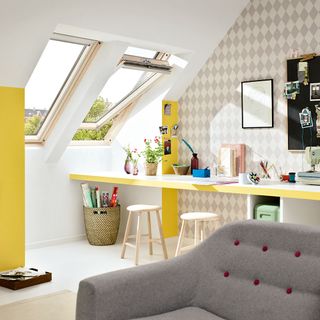attic office room with armchair